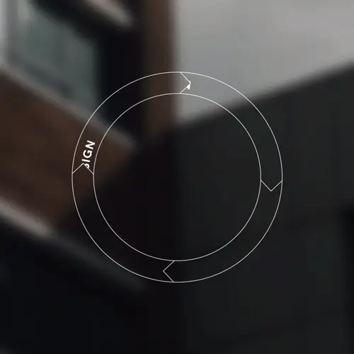 A circular life cycle diagram, design to operations, over a building, from the Unity AEC sizzle reel.